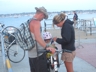 Getting baby ready for the bikeride, Folk Festival 2014