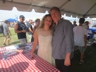 Performing artists at artist greeting table, Folk Festival 2015