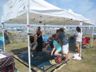 Getting a massage while listening to music on the Fort stage, Folk Festival 2018