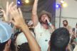 Langhorn Slim performing in the middle of the audience, Folk Festival 2018