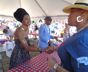 Jazzmeia Horn greeting fans at the Artist Merchandise table, Jazz Festival 2018