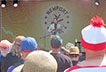 Festival participant taking notes following a performance at the Museum stage, Folk Festival 2019