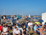 Crowd at Fort Stage with Newport Harbor in background, Jazz Festival 2023