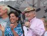George with Govonor Gina Raimondo during announcement the state of Rhode Island renewed its lease agreement with Fort Adams in Newport to keep the festivals continuing for another 25 years, Newport Folk Festival, 2018