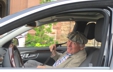 George departing from a Bridgefest function at Rough Point mansion, 2013