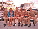 Guest enjoying company of navy personnel at The Coffee Grinder cafe on the Newport waterfront