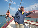 Argentinian guest enjoys a day sail in Newport Harbor- far away from the boat he captains in Tahiti